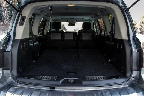 Huge, clean and empty car trunk in interior of compact suv. Rear view of a SU Stock Photos