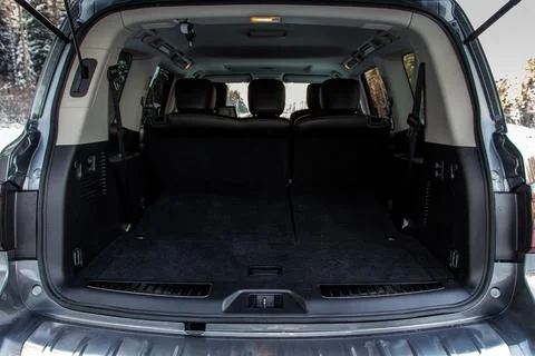 Huge, clean and empty car trunk in interior of compact suv. Rear view of a SU Stock Photos