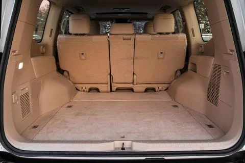 Huge, clean and empty car trunk in interior of compact suv. Rear view of a SU Stock Photos
