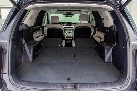 Huge, clean and empty car trunk in interior of compact suv. Rear view of a SU Stock Photos