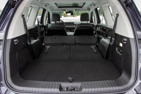 Huge, clean and empty car trunk in interior of compact suv. Rear view of a SU Foto stock