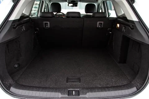 Huge, clean and empty car trunk in interior of compact suv. Rear view of a SU Stock Photos