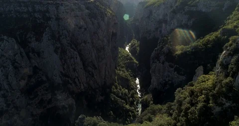 Huge cliffs and river at Gorges du Verdon, France in autumn drone aerial 4k Stock Footage 125755719