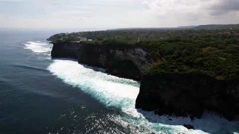 Huge cliffs next to the ocean Stock Footage 194413115