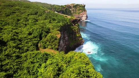 Huge cliffs next to the ocean Stock Footage 194413831