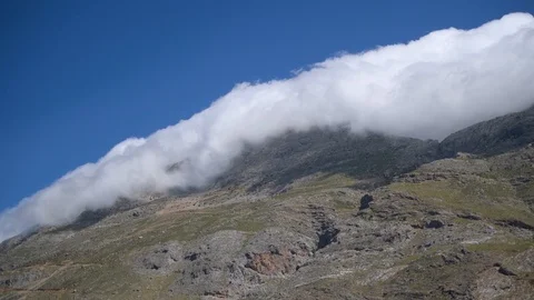 Huge cloud in Cretan mountains near Rethymno region. Greece, Crete Island Stock Footage 90896006