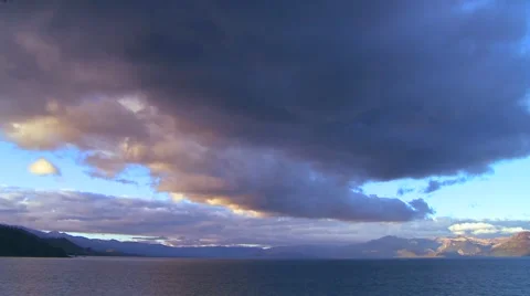 Huge cloud formations form over Lake Tahoe in this time lapse shot. Stock Footage 943239