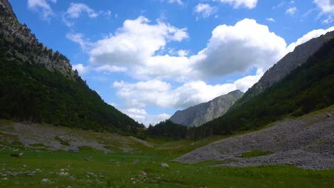 Huge cloud formations over a mountain valley in Prokletije Montenegro 4K Video stock 118085709