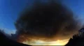 Huge cloud of smoke sunset HD Footage