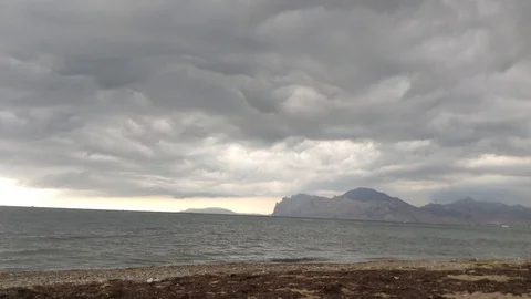 Huge Clouds and Black Sea. Calm before the storm . Karadag , Crimea , Russia 2 Stock Footage 87095541