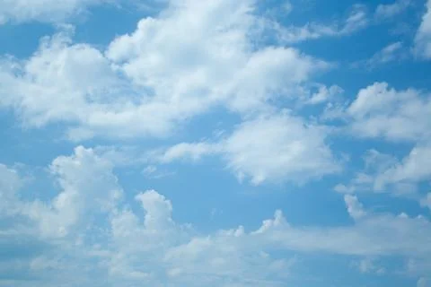 Huge clouds in blue sky Stock Photos