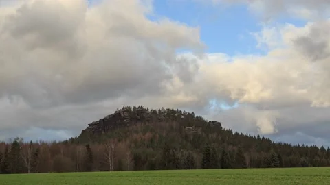 Huge clouds moving over Gohrisch mountain,4k,timelapse Stock Footage 230895167