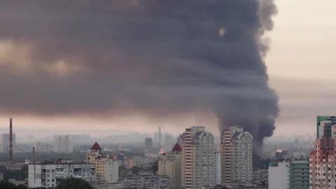 Huge column of thick black smoke rising high over Kyiv skyline  Stock Footage 338082327