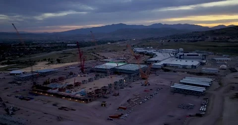 Huge construction project site Lehi, Utah's Silicon Slopes - drone orbit Stock Footage 336898784