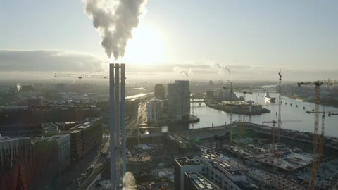 Huge construction site and industry chimney in Hamburg City at the flow Stock Footage 130119166