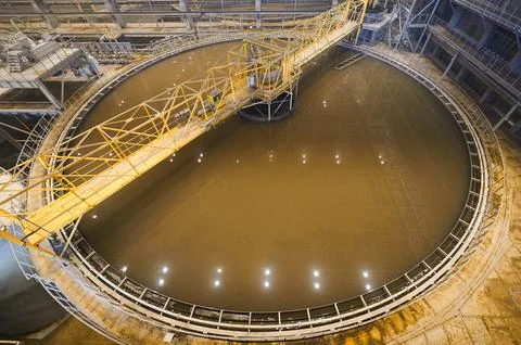Huge container to separate liquid pulp material in workshop Stock Photos