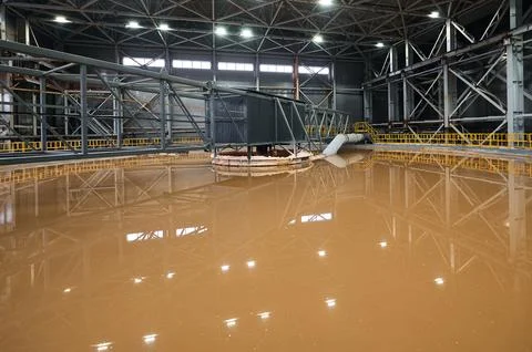 Huge container to separate liquid pulp material in workshop Stock Photos
