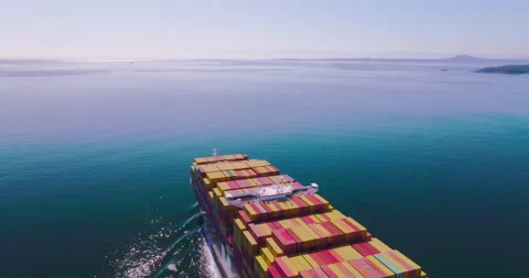 Huge container ship reveals cargo and smoke Salish Sea 5k 4k Stock Footage 179752519
