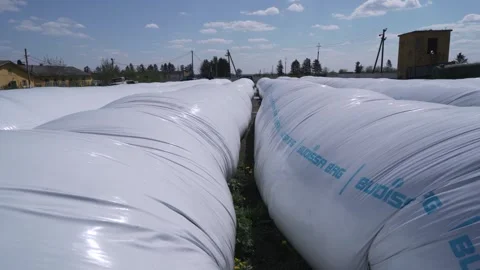 Huge containers of feed for animals Stock Footage 245973356