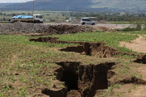 Huge cracks develop along Kenya's Rift Valley town of Mai Mahiu - 06 Apr 2018 Stock Photos
