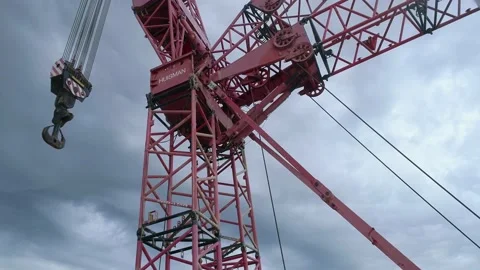 Huge crane on the background of a cloudy sky Stock Footage 138225002