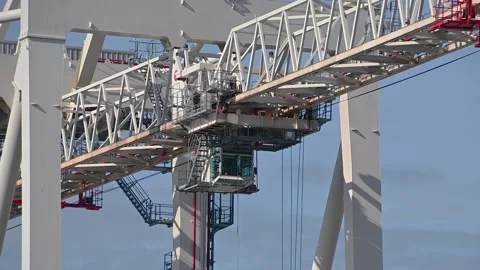 Huge crane operating. Unloading and loading containers Stock Footage 138897982