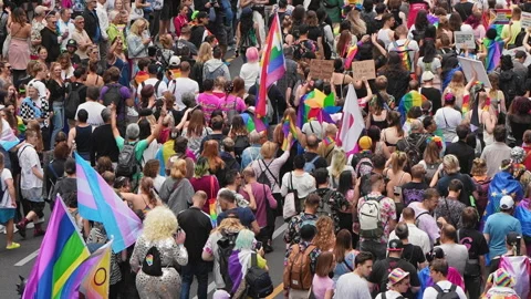 Huge crowd hang out fun lgbt festival at Berlin Germany. German gay pride parade Stock Footage 274043246