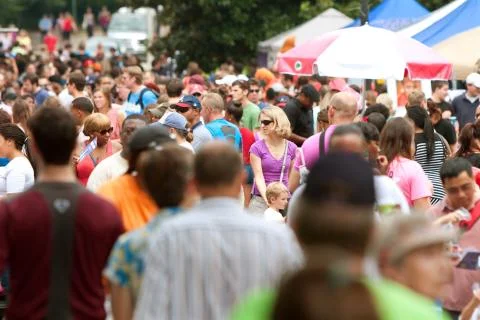 Huge crowd moves through summer festival in atlanta Stock Photos