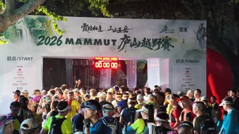 Huge Crowd Packed at Start Arch as Clock Hits Zero, Arms Raised, Lushan Stock Footage 346711476