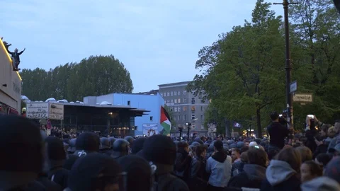 Huge crowd protest, Palestine flag, labor day demonstration, riot police, Berlin Stock Footage 90038052