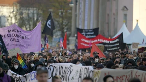 Huge crowd of protesters marching in ber... | Stock Video | Pond5