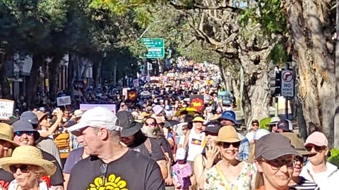 HUGE CROWDS MARCH IN SYDNEY SUPPORT OF REFERENDUM YES VOTE NSW 4K Stock Footage 250447466