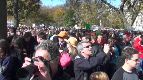 Huge crowds mass in the streets at a political rally in Washington D.C. Stock Footage