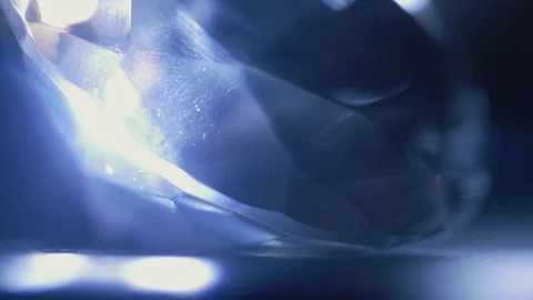 A huge cut diamond is shining and sparkling in the dark. Extra close up. Stock Footage 116630331