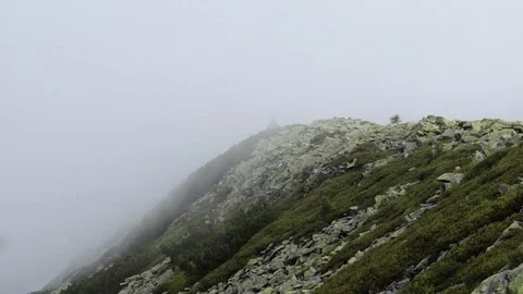 Huge dark thunderstorm cloud with rain in the mountains Stock Footage 119657412