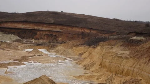 Huge deep quarry at the site of sand extraction Stock Footage 166938336