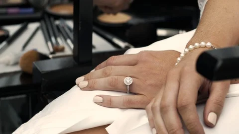 Huge diamond ring on hand Stock Footage 93644946