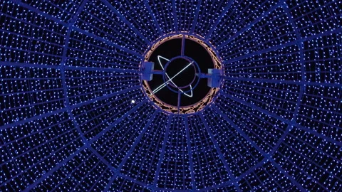 A Huge Dome Surrounded By Thousands Of Blue Christmas Lights, Wide Shot Stock Footage 307705027
