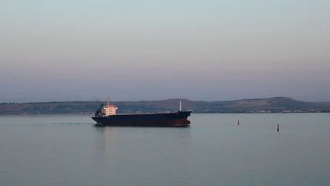 A huge dry cargo ship goes by sea 스톡 동영상 79155156