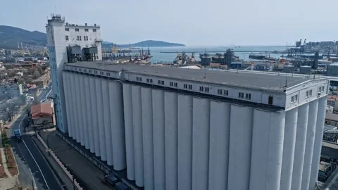 A huge elevator building for storing grain crops. Aerial Footage Stock Footage 261281627