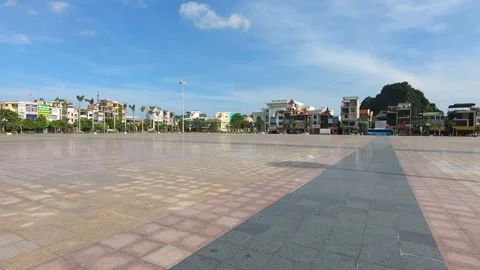 Huge empty square under hot summer sun in Cam Pha, Vietnam Video stock 217870645