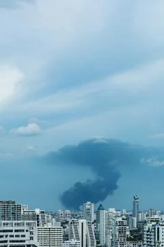 Huge explosion and fire at plastic factory on outskirts of town Stock Photos
