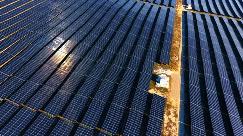 Huge field covered with modern solar panels. Technology backdrop. Renewable 動画素材 334339180