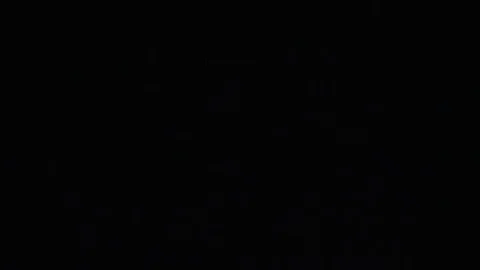 Huge fire exploding in super slow motion over the night sky in red and green Stock Footage 93816297