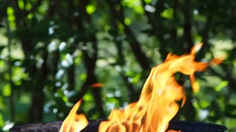Huge flames on grill at closeup Stock Footage 76234849