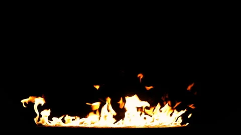 Huge flames rising from lower edge. Real Fire shot in 50 fps and isolated  Stock Footage 142064607