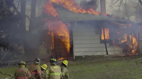 Huge flames take over house Stock Footage 61180194