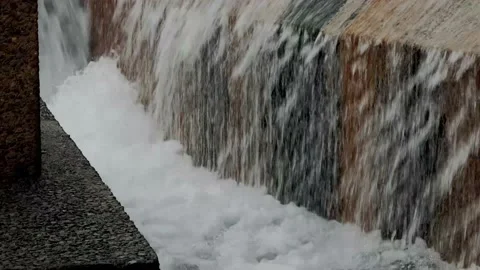 Huge flows and cascades down stone water feature used in Logan's Run movie Vídeo Stock 166421852