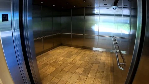 Huge freight and passenger elevator in mall Stock Footage 111806212