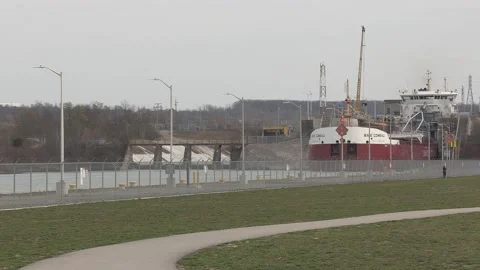Huge freighter cargo container ship sailing up the Welland canal Видео 152058593